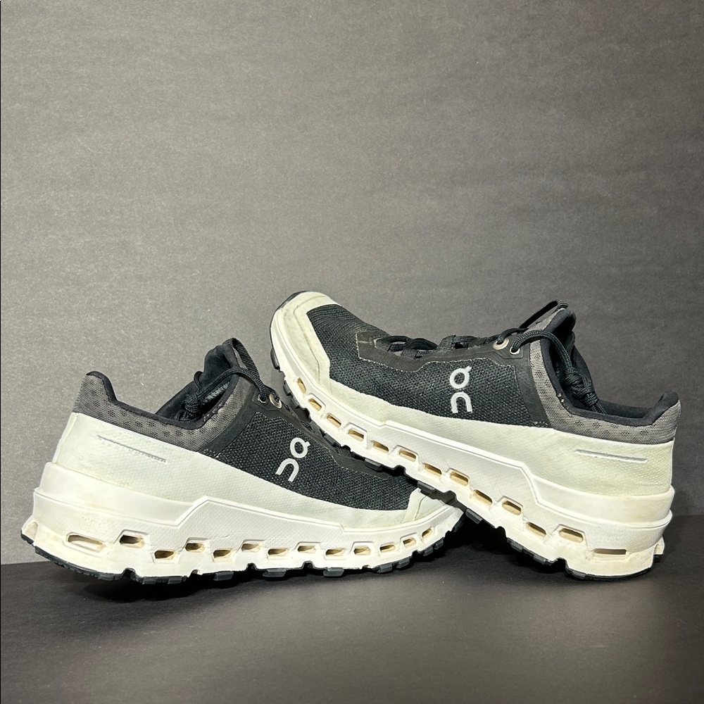 On Running Women's Black and White Running Shoes